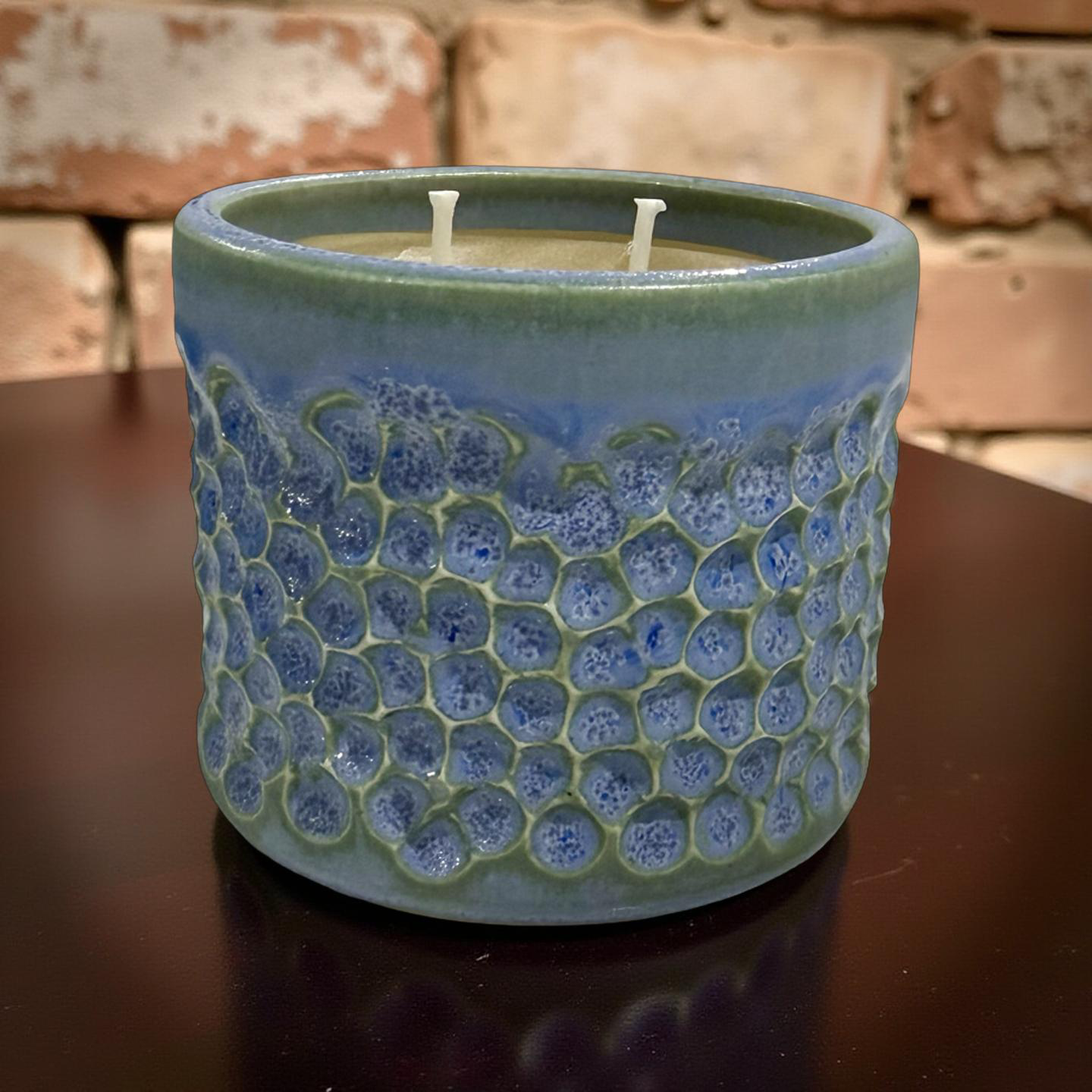 “Ariel” pure beeswax candle in local pottery