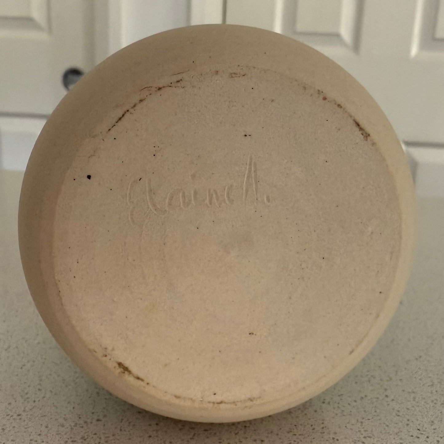 “Sea Foam” pure beeswax candle in local pottery