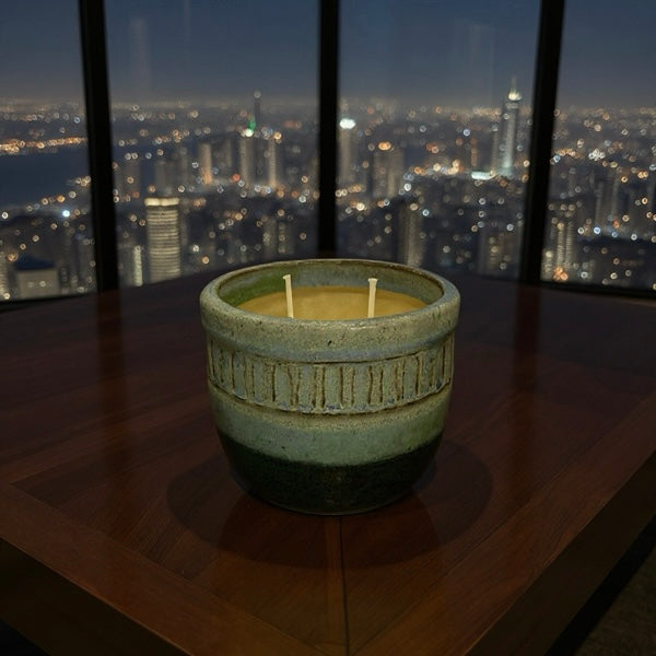 “Nora” pure beeswax candle in local pottery