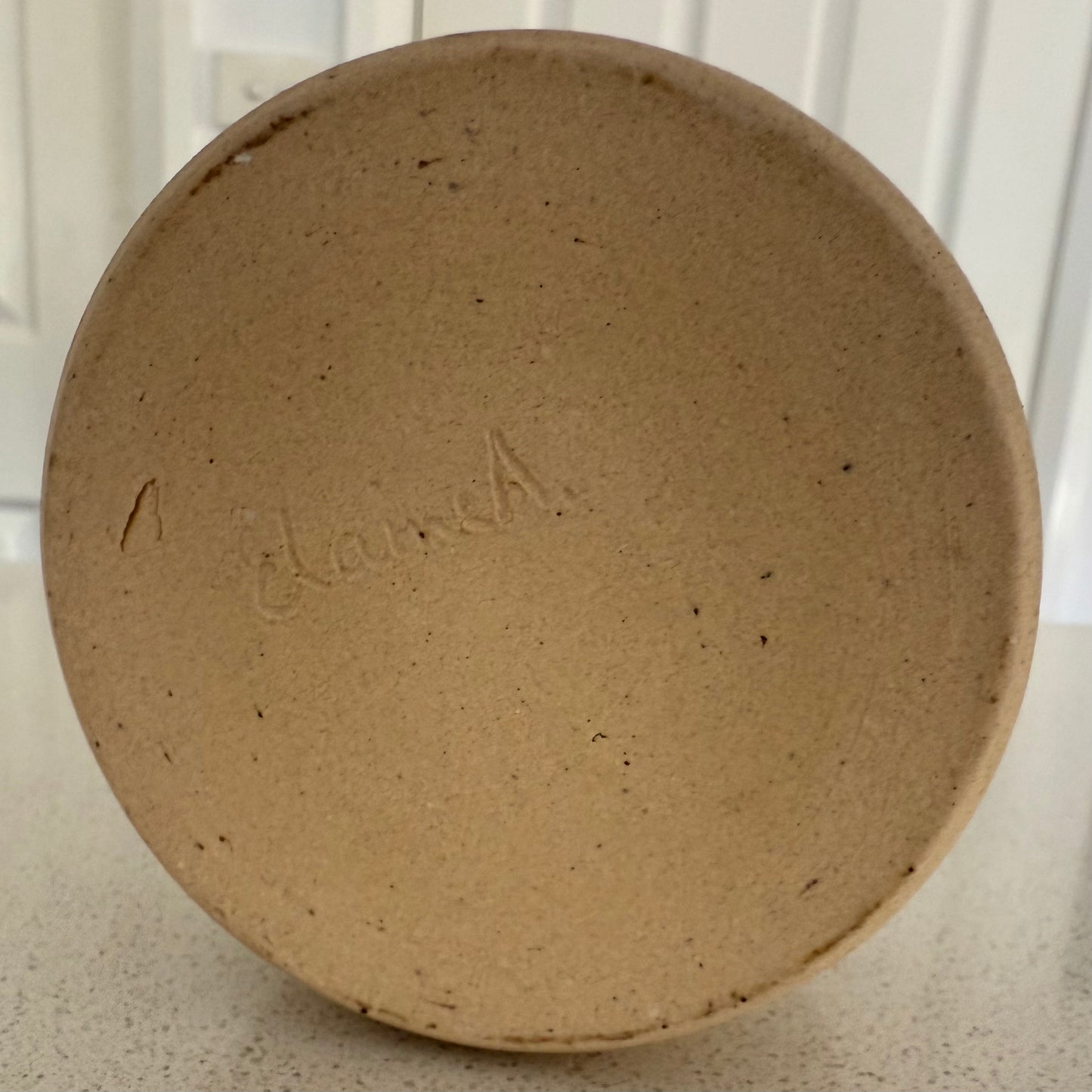 “Sand & Stone” pure beeswax candle in local pottery