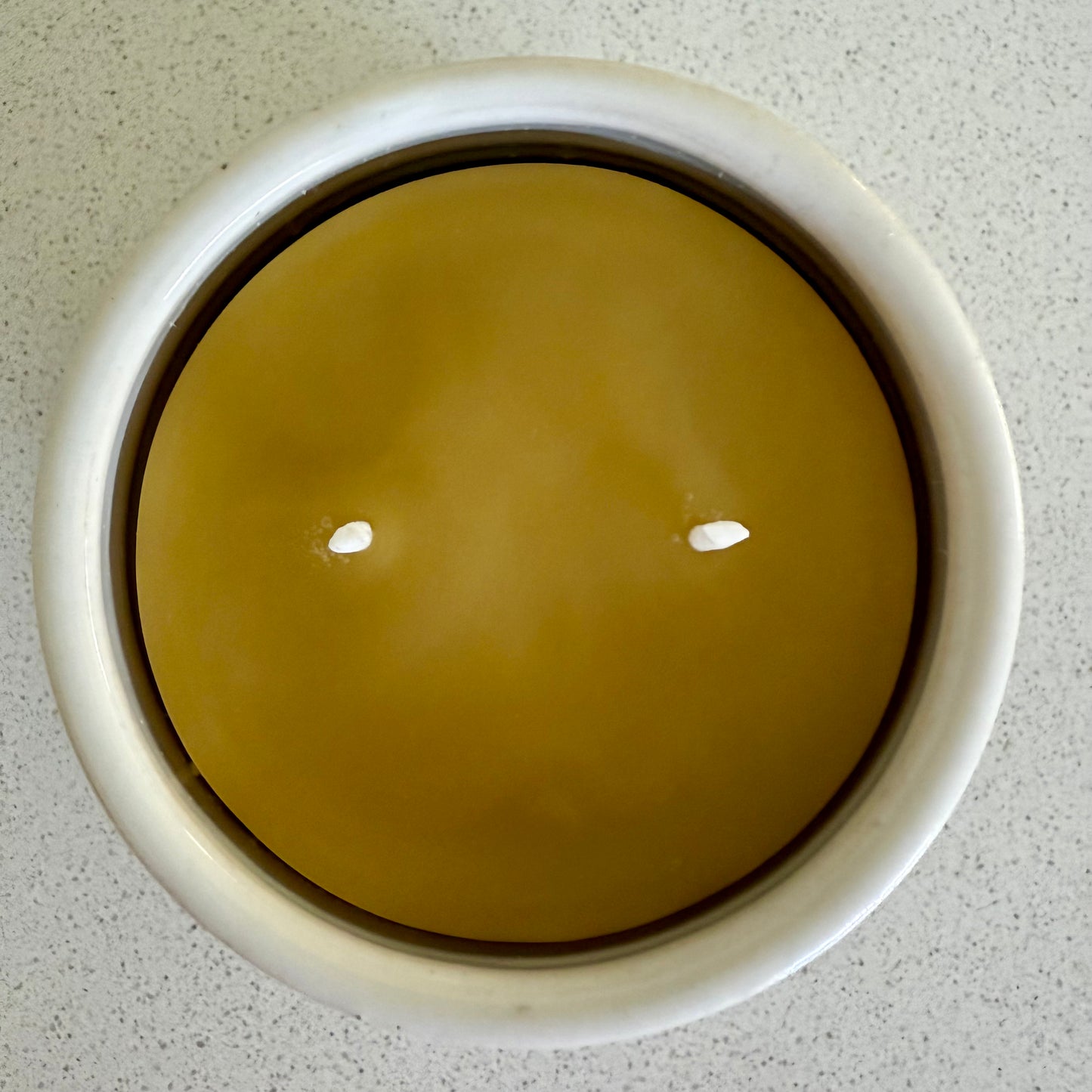 “Sand & Stone” pure beeswax candle in local pottery