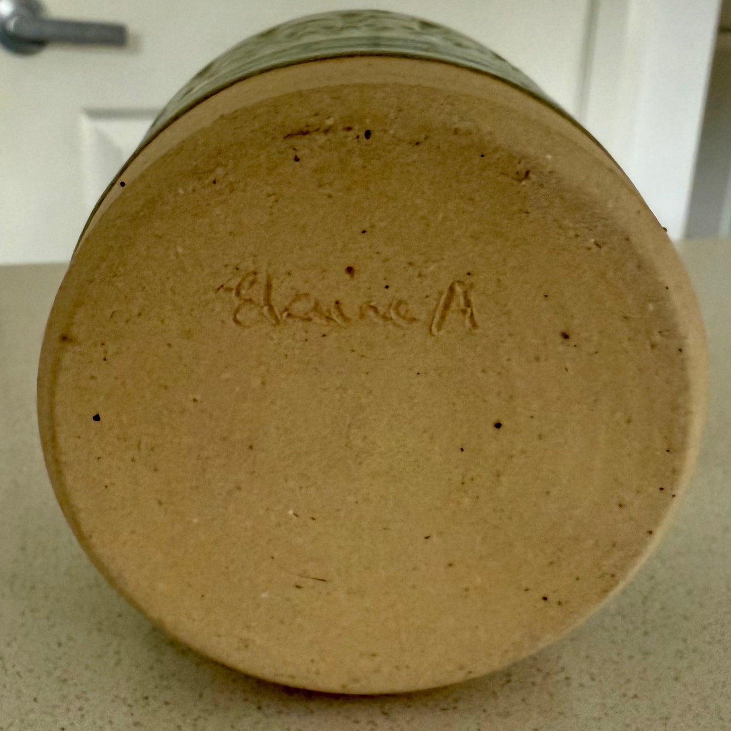 “Emerald Ember” pure beeswax candle in local pottery