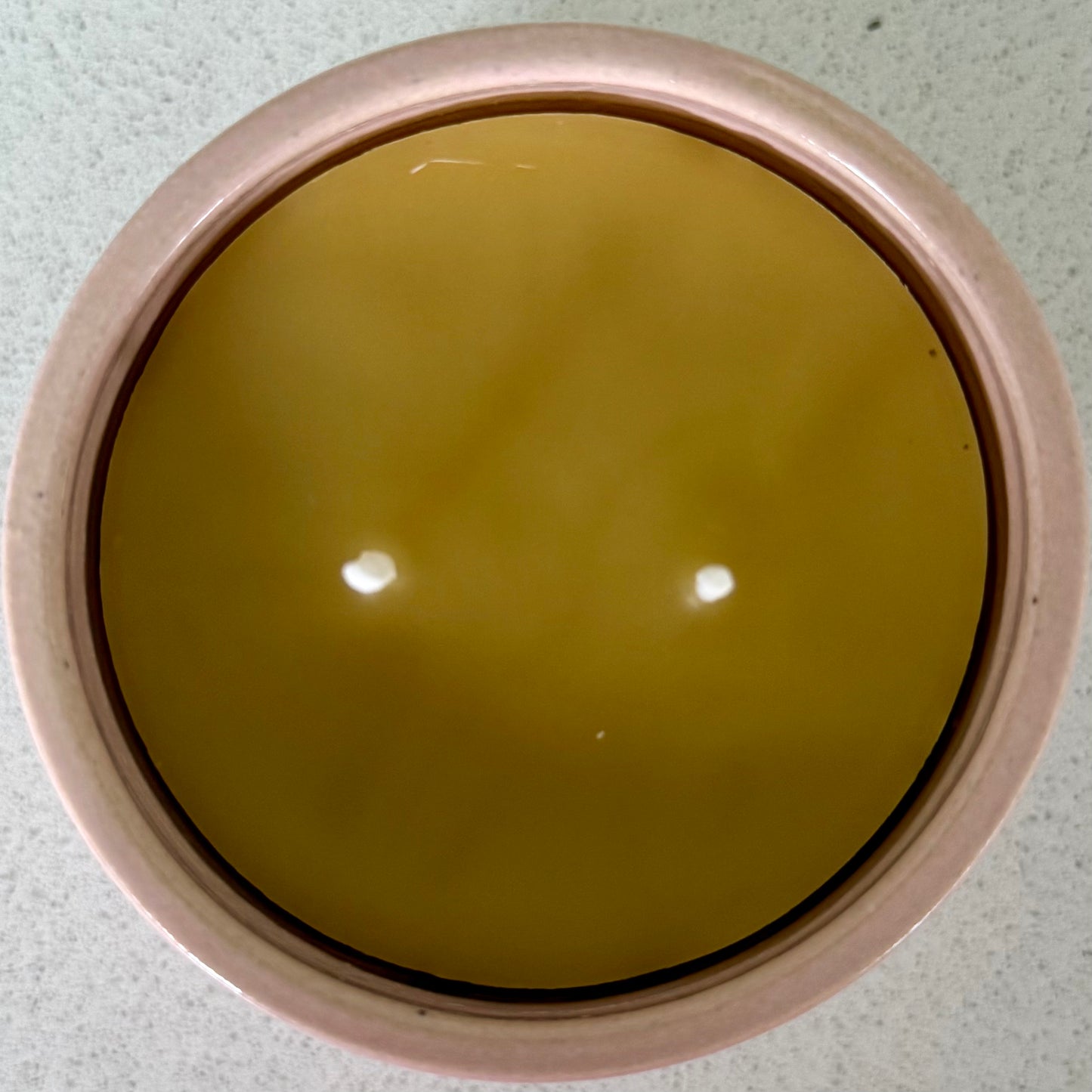 “Dusty Bloom” pure beeswax candle in local pottery