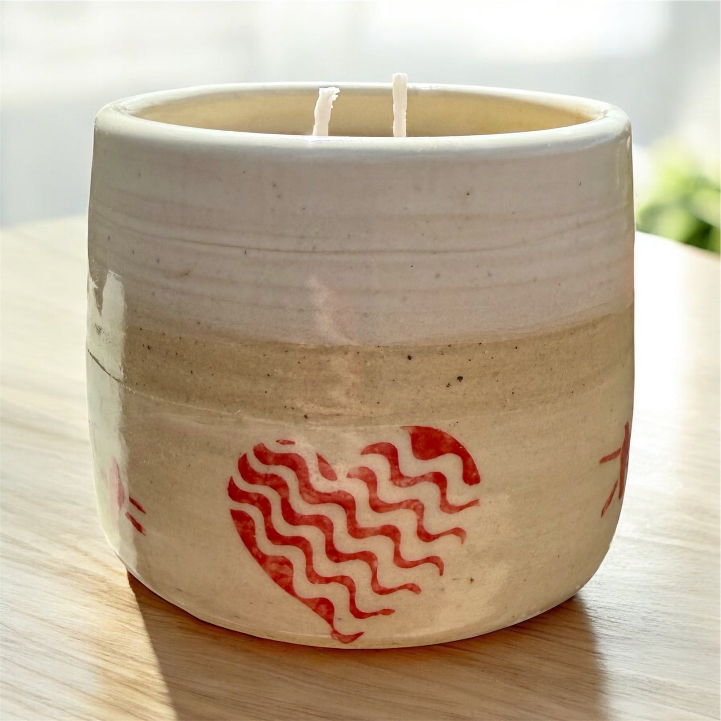 “Red Birds” pure beeswax candle in local pottery