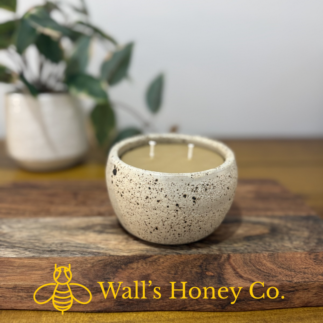 “Daisy” pure beeswax candle in local pottery