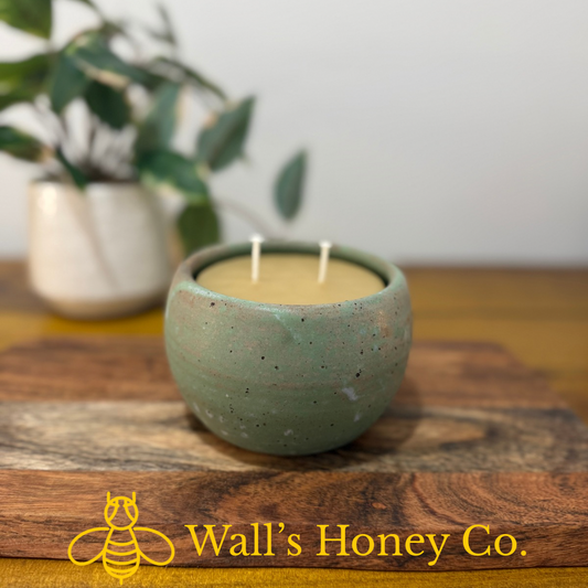 “Freya” pure beeswax candle in local pottery