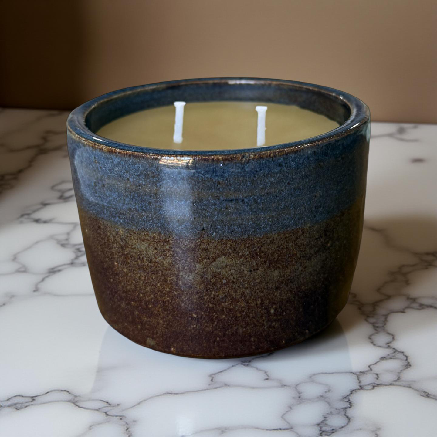 “Earth Meets Sky” pure beeswax candle in local pottery
