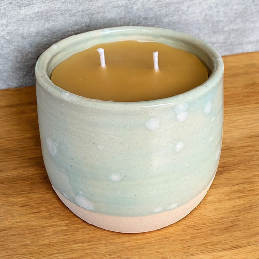 “Sea Foam” pure beeswax candle in local pottery
