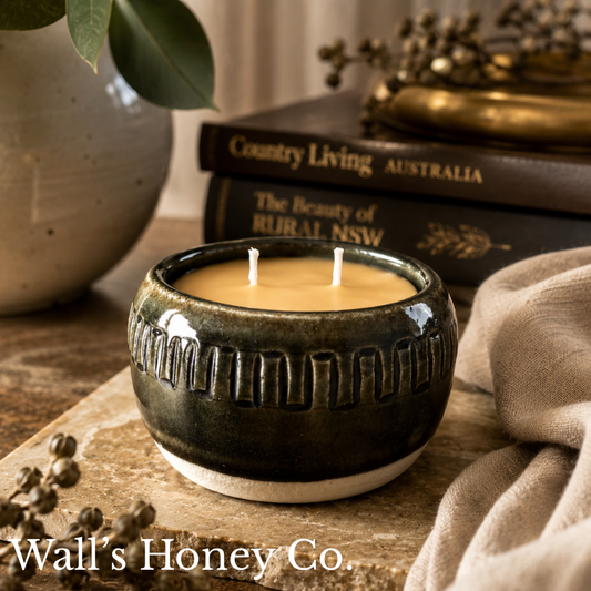“Evie” pure beeswax candle in local pottery