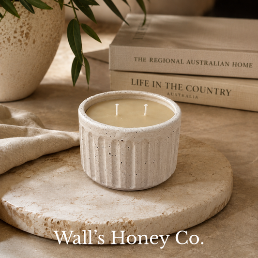 “Chloe” pure beeswax candle in local pottery
