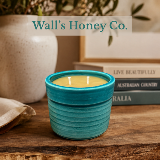 “Sienna” pure beeswax candle in local pottery