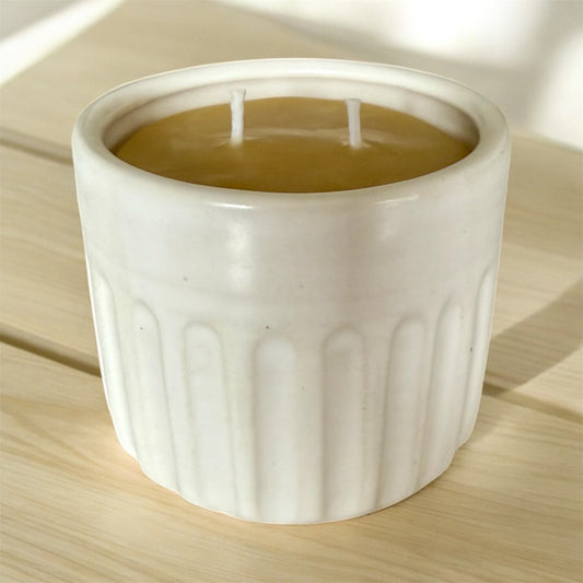 “Soft Ivory” pure beeswax candle in local pottery