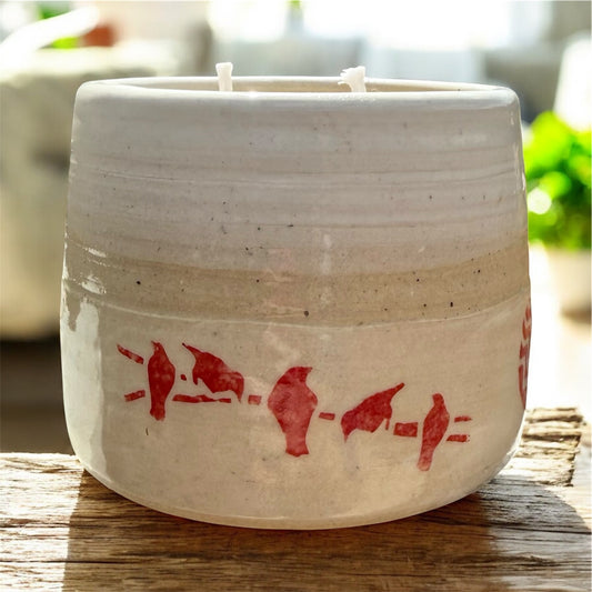 “Red Birds” pure beeswax candle in local pottery