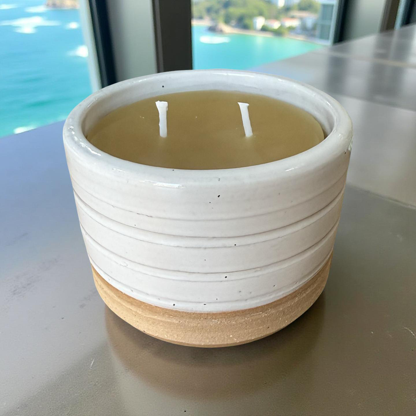 “Catherine” pure beeswax candle in local pottery